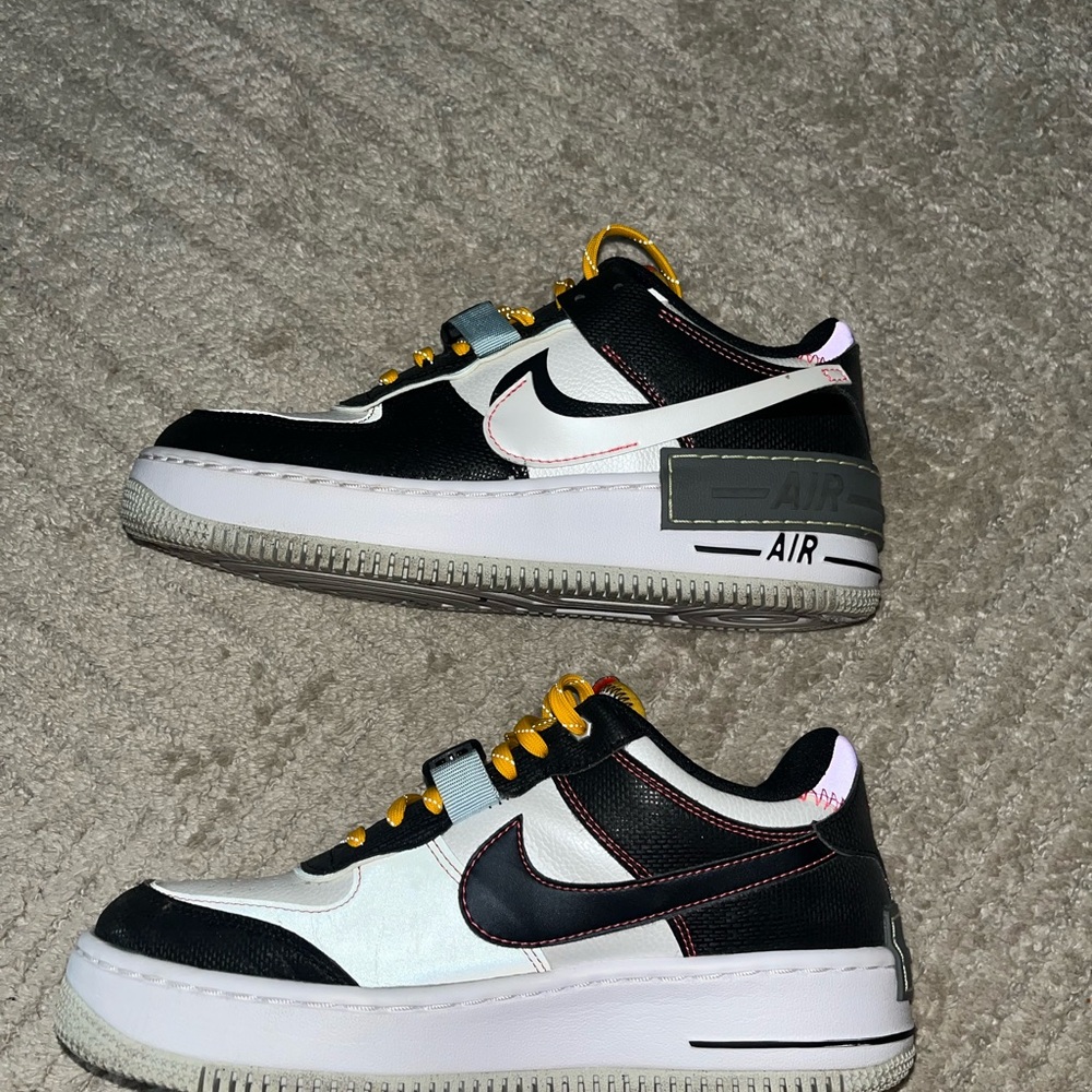 Nike Sneakers with Black and Yellow Details